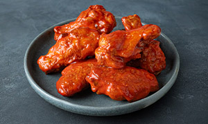 Free 6 Classic Wings with Any X-Large Specialty Pizza